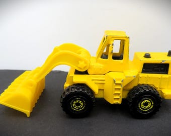 Cargadora de 3 ruedas Hot Wheels amarilla, modelo de 1979, de metal fundido a presión.