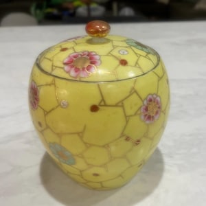 Vintage porcelain cookie jar with lid