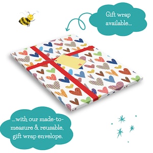 May include: A wrapped gift with a white background covered in colorful heart patterns. The gift is tied with a red ribbon and has a yellow tag. A cartoon bee and text bubbles that say "Gift wrap available..." and "...with our made-to-measure & reusable, gift wrap envelope."