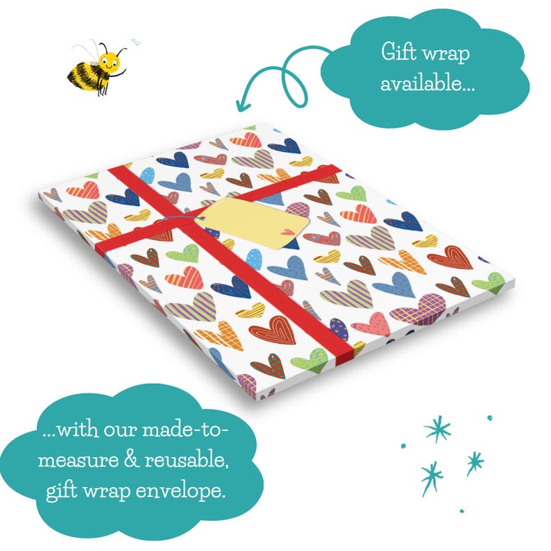 May include: A wrapped gift with a white background covered in colorful heart patterns. The gift is tied with a red ribbon and has a yellow tag. A cartoon bee and text bubbles that say "Gift wrap available..." and "...with our made-to-measure & reusable, gift wrap envelope."