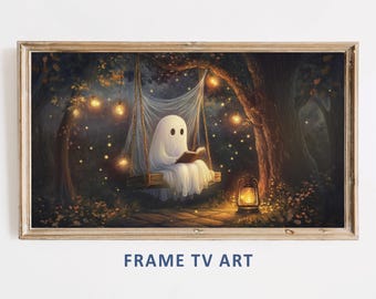 May include: A framed digital art print depicts a friendly ghost reading a book while sitting on a swing in a forest. The artwork features warm lighting from string lights and a lantern, creating a cozy, whimsical scene. The text "FRAME TV ART" is displayed at the bottom.