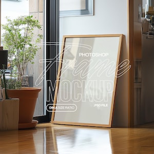 Può includere: Un mockup di cornice in legno con sfondo bianco e il testo "PHOTOSHOP FRAME MOCKUP DIN A SIZE RATIO PSD FILE".