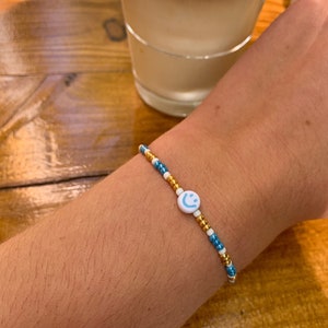 Smiley Perlenarmband Blau