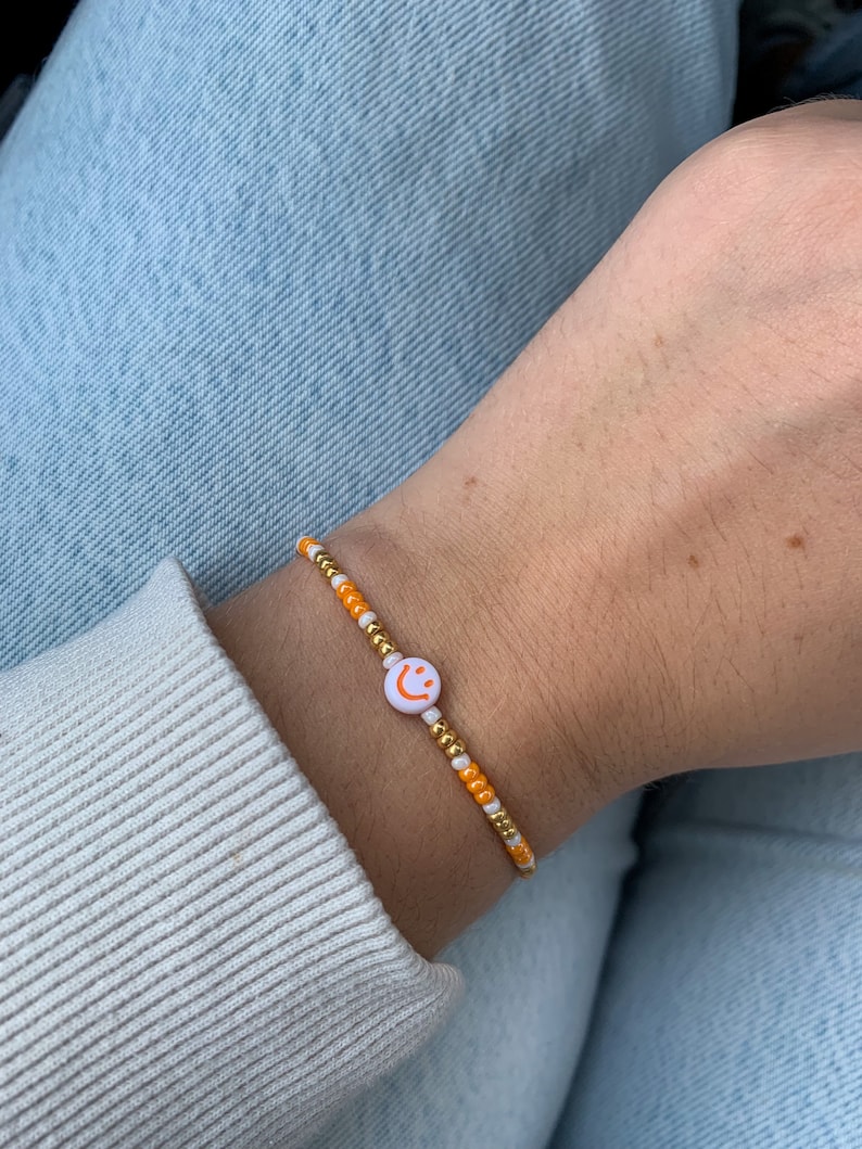 Smiley Perlenarmband Orange