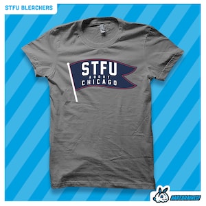 May include: Gray t-shirt with a blue flag graphic that says "STFU ABOUT CHICAGO".