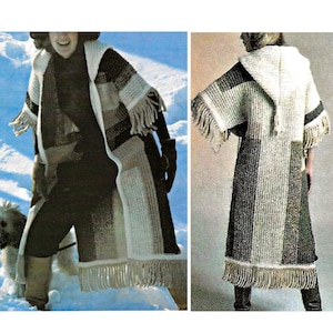 May include: A long, hooded poncho with a striped pattern in shades of white, black, and tan. The poncho features fringe along the bottom and sleeves. The person in the image is wearing the poncho in a snowy environment.