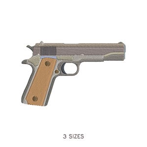 May include: An embroidered design of a handgun, featuring a detailed stitch pattern in shades of gray, brown, and tan. The handle has a textured appearance, and the text "3 SIZES" is displayed below the image.