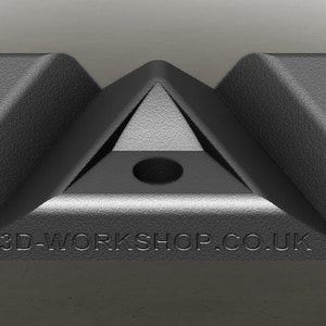 May include: Black plastic corner brace with a triangular shape and a hole in the center. The brace has the text "3D-WORKSHOP.CO.UK" printed on the bottom.