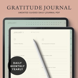 May include: A digital tablet displaying a printable gratitude journal template. The template includes a calendar, daily prompts, and a grid for journaling. The text "GRATITUDE JOURNAL" and "UNDATED GUIDED DAILY JOURNAL PDF" is displayed at the top of the screen.