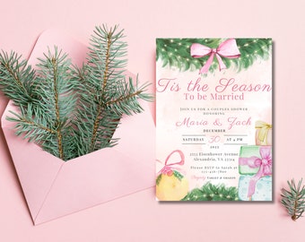 May include: A pink invitation with the text "Tis the Season To be Married" and details for a couples shower honoring Maria & Zach. The invitation features watercolor illustrations of gifts, bows, and greenery. A pink envelope with evergreen branches is on the left.