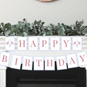 May include: A white banner with blue trim and red letters that reads "HAPPY BIRTHDAY". The banner is decorated with small red, white, and blue American flags and fireworks.