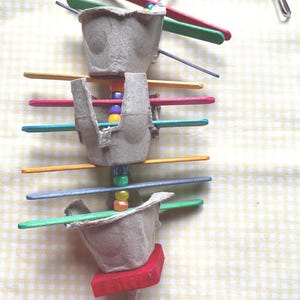 Bird popsicle stick cardboard shredder