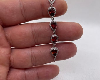 Lariat style bracelet with pear shape ruby and lab diamonds 925 sterling silverware