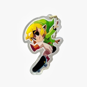 May include: A green and yellow cartoon character with a green hat and a pointy ear is skateboarding. The character is wearing red shoes and is holding a skateboard with a black deck and blue wheels. The character is on a white background.