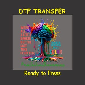 May include: A colorful brain with paint dripping from it, surrounded by crayons. The text reads "We're all a little broken but the last time I checked: Broken crayons still color".  Ready to Press.