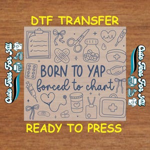 May include: A DTF transfer design with medical-themed illustrations, including a clipboard, scissors, pills, and a stethoscope. The text reads "BORN TO YAP forced to chart" and "READY TO PRESS."