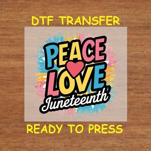 May include: A DTF transfer sheet with a colorful graphic that says "Peace Love Juneteenth" with a heart in the middle of "Love".