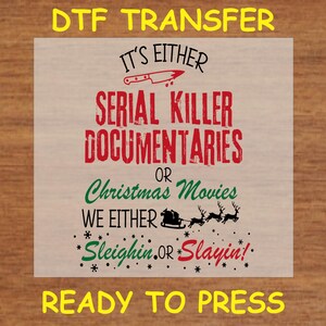 May include: A ready-to-press iron-on transfer sheet with a Christmas-themed design. The design features the text "It's either serial killer documentaries or Christmas movies. We either sleighin' or slayin'!".