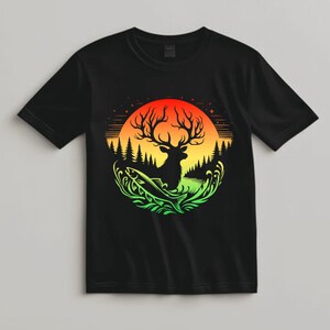 May include: Black t-shirt with a colorful graphic of a deer standing in a lake with a fish jumping out of the water. The graphic is surrounded by a circle of green leaves and a sunset.