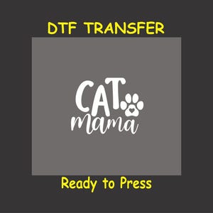 May include: White text on a gray background that reads "CAT mama" with a paw print and heart. The text "DTF TRANSFER" is in yellow at the top of the image and "Ready to Press" is in yellow at the bottom.