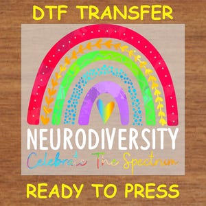 May include: A DTF transfer design featuring a rainbow with a heart in the center and the text "Neurodiversity Celebrate The Spectrum" and "Ready To Press".