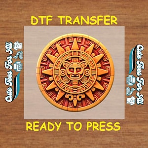 May include: A circular, orange and red Aztec sun stone design with a face in the center. The words "DTF TRANSFER" and "READY TO PRESS" are in yellow text. The design is on a transparent background.
