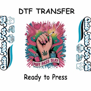 May include: A pink, green, and blue DTF transfer design with a hand holding a lit cigarette, surrounded by hearts and smoke. The text "PUFF PASS SLAY" is written in a white banner.