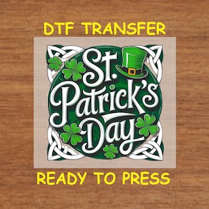May include: A green and white DTF transfer design featuring the text "St. Patrick's Day" with a shamrock and a leprechaun hat. The design is ready to press.