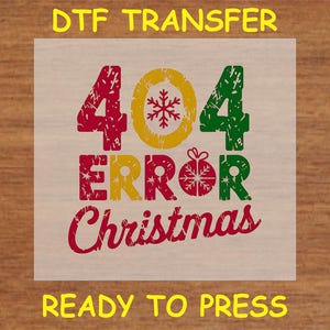 May include: Red, green, and yellow distressed iron-on transfer design with the text "404 ERROR Christmas" on a white background. Ready to press.