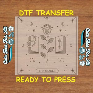 May include: A digital transfer design featuring a rose, two books, a snake, and stars. The text "THE READER" is printed on a white rectangle. The design is ready to press.