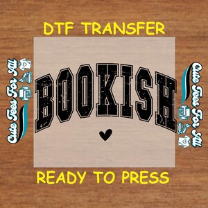 May include: A black and white iron-on transfer design with the word "BOOKISH" in a distressed, varsity-style font. A small heart is below the word. The design is ready to be pressed onto a t-shirt or other fabric.