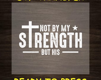 May include: White iron-on transfer design with a cross and the text "Not by my strength but his" on a wood background. The design is ready to press.