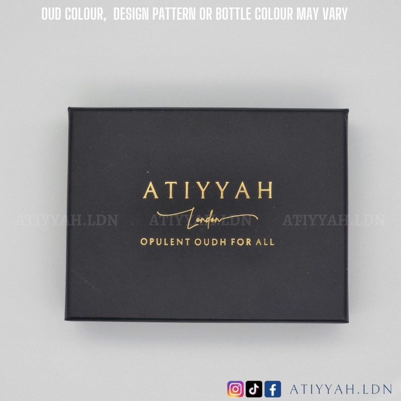 May include: A black box with gold lettering that reads "ATIYYAH London" and "OPULENT OUDH FOR ALL".