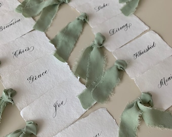 Ivory place cards with silky ribbon, white wedding name cards, calligraphy deckled edge paper card, dinner party plate cards