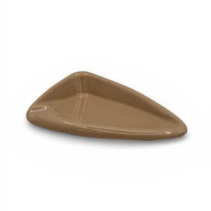 May include: A brown, triangular ashtray with a glossy finish. The ashtray has a shallow, elongated design with a curved edge and a small indentation for resting items. The overall shape is smooth and modern.