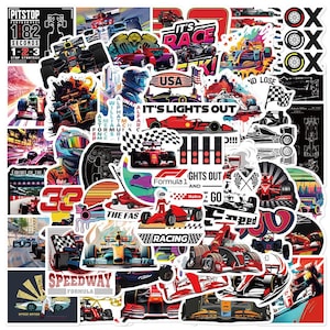 May include: A collection of colorful stickers featuring Formula 1 race cars, logos, and phrases like "It's Lights Out" and "The Fast Lane".