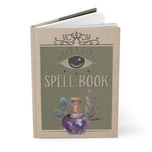 May include: A green and brown spell book with the words "SPELL BOOK" on the front cover. The cover also features an illustration of an eye, a potion bottle, and some plants.