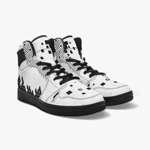 May include: A pair of white high-top trainers with a black geometric pattern. The shoes have black laces and a black sole.