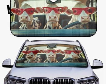 Lindo y elegante tema de vaca, que ofrece protección UV para su parabrisas. Esta divertida visera para coche de becerro es un regalo perfecto para todos los vehículos.