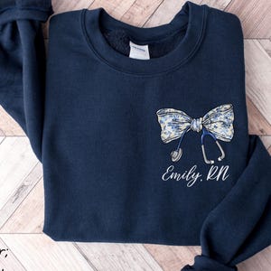 Custom Registered Nurse Sweatshirt With Name, Personalized RN Pocket Hoodie, Nurse Life Outfit, Nurse Appreciation Clothing, Cute Nurse Gift