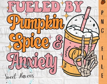 May include: A pink and orange graphic design with the text "Fueled by Pumpkin Spice & Anxiety" and a cartoon image of a pumpkin spice latte with a skeleton hand giving the peace sign.