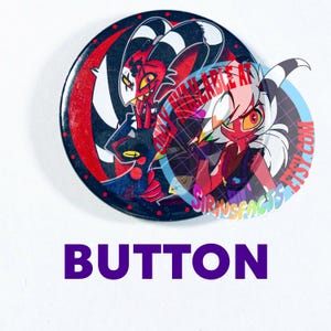 May include: A circular pin-back button featuring a red and black illustration of two animated characters with horns. The design includes the text ONLY AVAILABLE AT SIRIUSFACTS.ETSY.COM overlaid in red and blue colors on the right side.