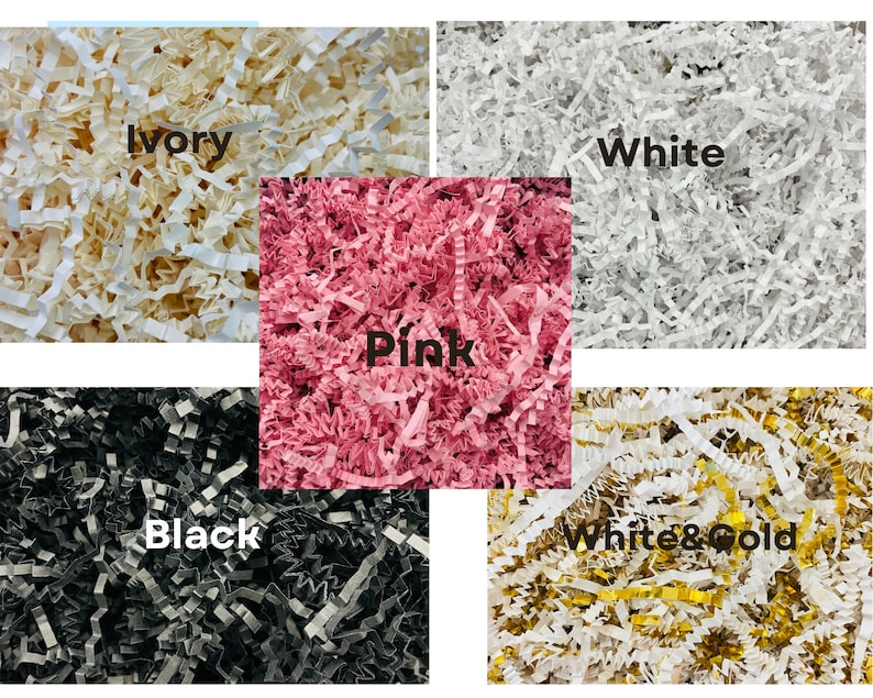 May include: Five different colors of shredded paper, including ivory, white, pink, black, and white and gold.