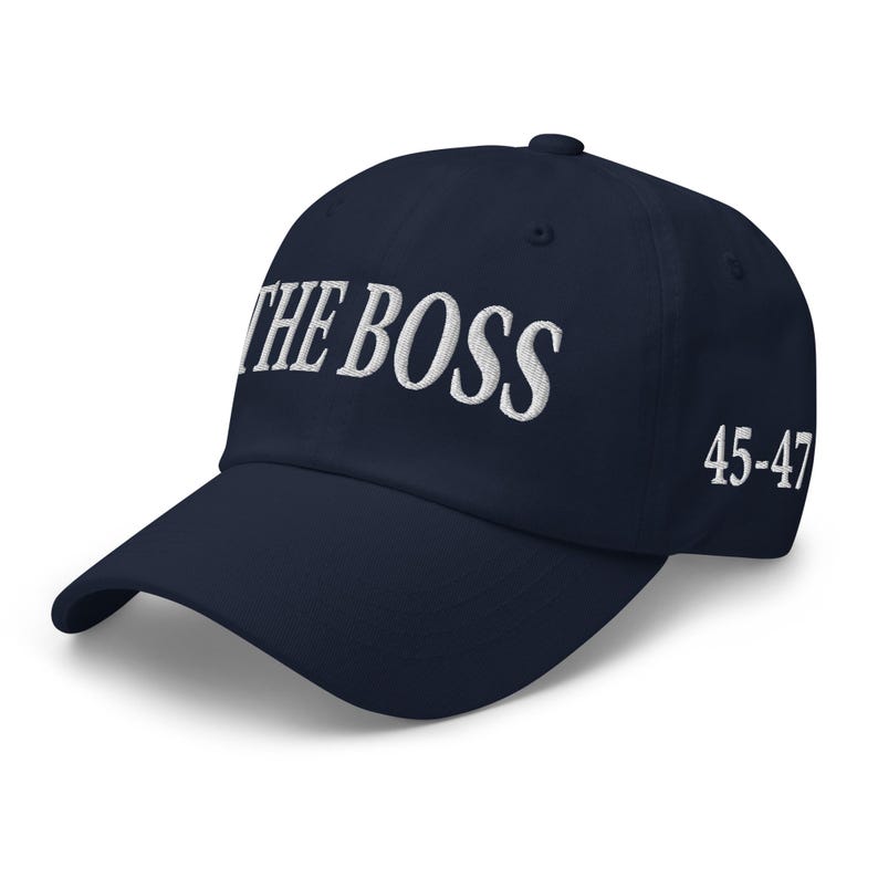 Pro-President 45-47 Dad hat: Donald Trump jokes 'I'm the boss' before meeting on final day of G7 summit - RAF COLLECTION