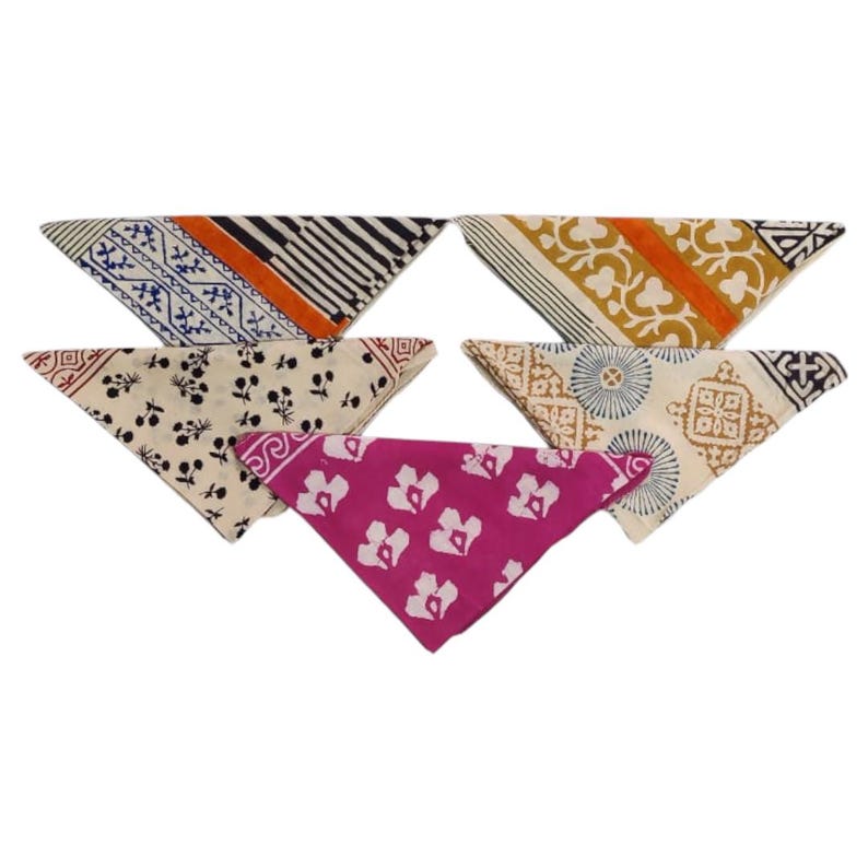 May include: Six triangular bandanas with various patterns and colors. Designs include floral, geometric, and striped patterns in shades of blue, orange, black, white, and pink. The bandanas are arranged in a fan shape.