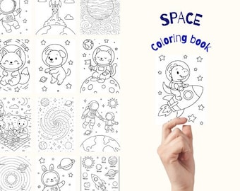May include: A black and white space-themed coloring book with various illustrations, including astronauts, planets, rockets, and animals in space suits. The text "SPACE coloring book" is displayed in blue. A hand is holding the coloring book.