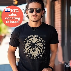 May include: A black t-shirt with a lion graphic and the text "Am Yisrael Chai" in Hebrew. The graphic also includes a Star of David and the text "Jew Got it Art".