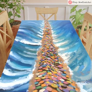 May include: A colorful abstract painting of a beach scene with a path of colorful circles leading to the horizon. The path is surrounded by blue water with white waves.