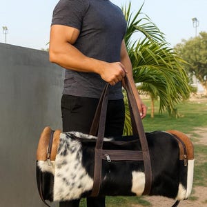 set of two cowhide leather duffel set one large duffel bag with a matching small toiletry bag , weekender bag cowhide bag