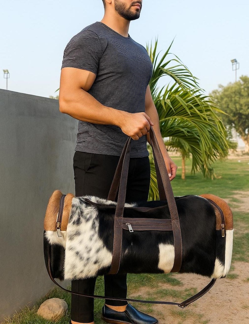 set of two cowhide leather duffel set one large duffel bag with a matching small toiletry bag , weekender bag cowhide bag